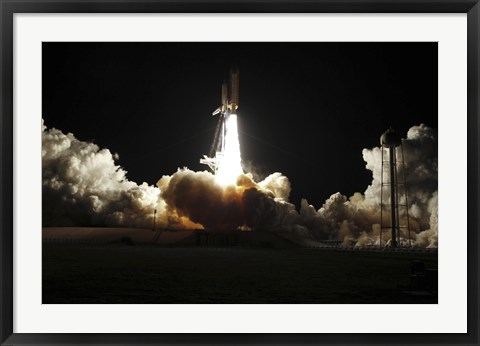 Framed Space shuttle Discovery lifts off from Launch Pad 39A at Kennedy Space Center in Florida, on the STS-131 mission Print