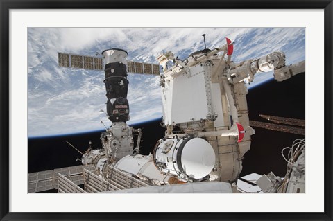 Framed Mini Research Module 1 attached to the International Space Station Print