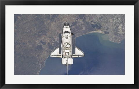 Framed Space Shuttle Atlanti Flying Above the Atlantic coast of Spain and the Gulf of Cadiz Print