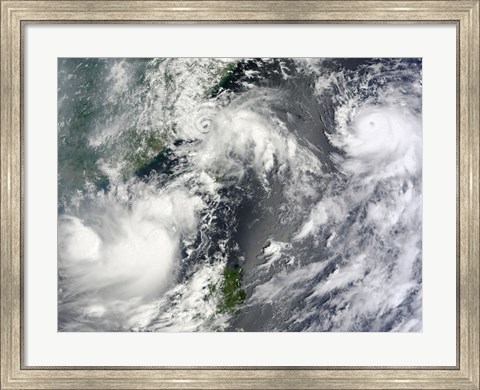 Framed Three Strong Storms Churn in the Pacific Ocean Basin off the Asian coast Print
