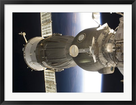 Framed Soyuz spacecraft backdropped by Earth Print