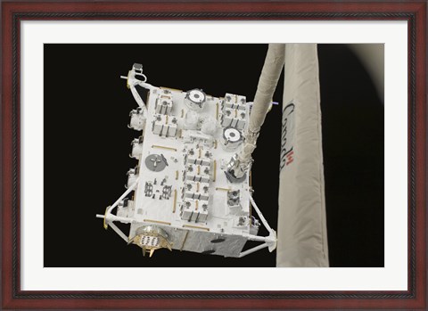 Framed Japanese Experiment Module Exposed Facility in the Grasp of the Shuttle&#39;s Remote Manipulator System Arm Print