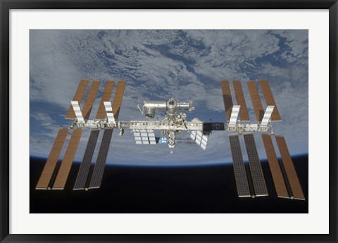 Framed International Space Station, Backdropped by the blackness of space and Earth&#39;s horizon Print