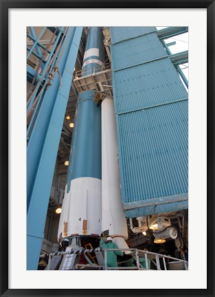 Framed Second Solid Rocket Motor is Moved into Place Alongside the Delta II First Stage Print