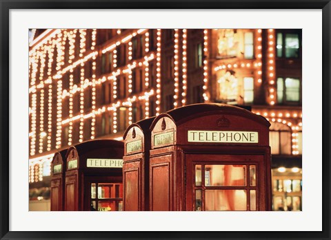 Framed Lit Telephone booth at Harrods, Knightsbridge, London, England Print