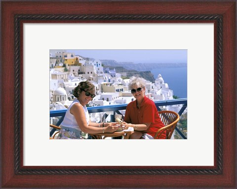 Framed Women Having Coffee on Cafe Terrace, Santorini, Greece Print