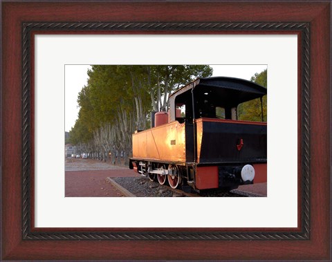 Framed Train Display along Riverbank Print