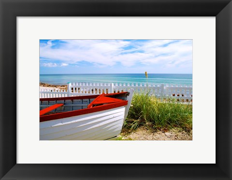 Framed Boat By The Beach Print