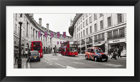Framed Buses and taxis in Oxford Street, London Print