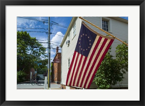 Framed New Hampshire, Portsmouth, Strawberry Banke Historic Area, building with US flag Print
