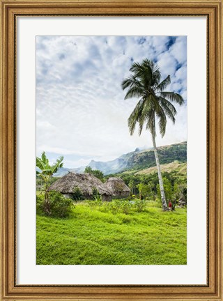 Framed Traditional thatched roofed huts in Navala in the Ba Highlands of Viti Levu, Fiji, South Pacific Print