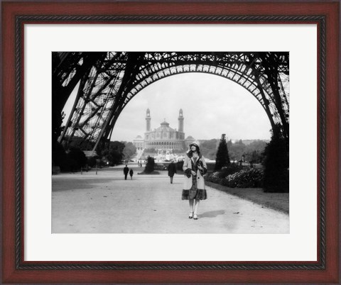 Framed 1920s Woman Walking Under The Eiffel Tower Print