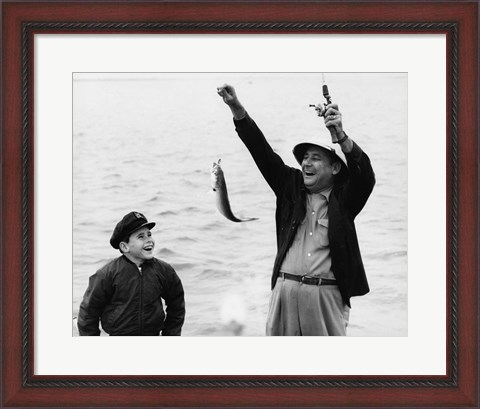 Framed 1950s 1960s Boy Fishing With Father Or Grandfather Print