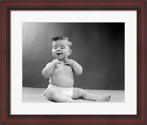 Framed 1950s Baby Seated With Eyes Closed Print