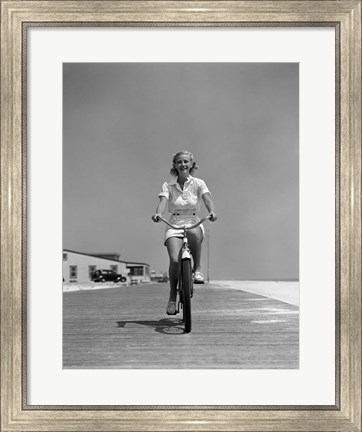 Framed 1940s Summer Time Smiling Woman Riding Bike On Beach Boardwalk Print