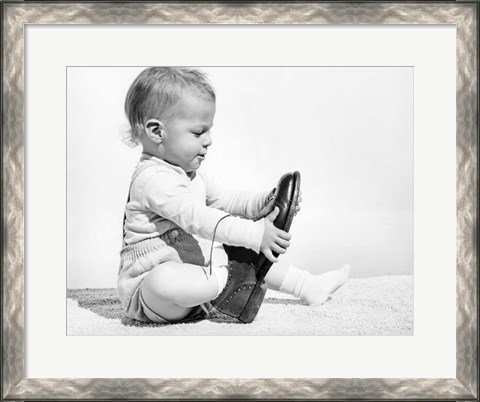 Framed 1960s Baby Boy Trying To Put On Man&#39;S Shoe Print