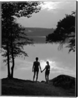 Framed Man And Woman In Bathing Suits Holding Hands Watching Sunset Lakeside