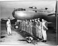 Framed Group of army soldiers standing in a row near a fighter plane, B-29 Superfortress
