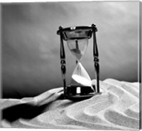 Framed Close up of hourglass on sand