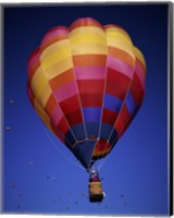 Framed Low angle view of a hot air balloon rising, Albuquerque International Balloon Fiesta, Albuquerque, New Mexico, USA