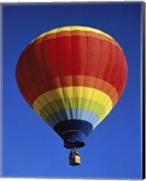 Framed Low angle view of a hot air balloon rising, Albuquerque International Balloon Fiesta, Albuquerque, New Mexico, USA