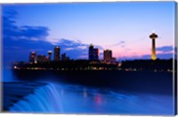Framed Waterfall with buildings lit up at dusk, American Falls, Niagara Falls, City of Niagara Falls, New York State, USA