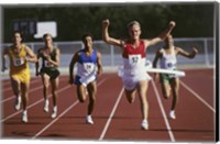 Framed Male athletes running on a running track