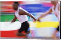 Framed Side profile of two young men passing a relay baton