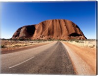 Framed Road passing through a landscape, Ayers Rock, Uluru-Kata Tjuta National Park, Australia
