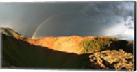 Framed Crater of an extinct volcano with a rainbow in the sky