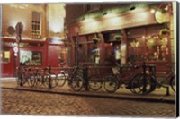 Framed Bicycles parked in front of a restaurant at night, Dublin, Ireland