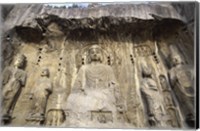 Framed Buddha Statue Carved on a wall, Longmen Caves,  ground view in China
