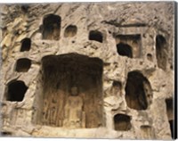 Framed Buddha Statue Carved on a wall, Longmen Caves in China