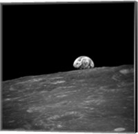 Framed first photograph taken by humans of Earthrise during Apollo 8.