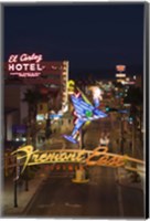 Framed Neon casino signs lit up at dusk, El Cortez, Fremont Street, The Strip, Las Vegas, Nevada, USA