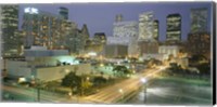 Framed Skyscrapers lit up at night, Houston, Texas