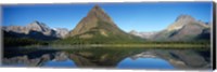 Framed Reflection of mountains in Swiftcurrent Lake, Many Glacier, US Glacier National Park, Montana, USA