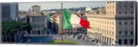 Framed Italian flag fluttering with city in the background, Piazza Venezia, Vittorio Emmanuel II Monument, Rome, Italy