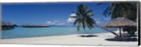 Framed Lounge chair under a beach umbrella, Moana Beach, Bora Bora, French Polynesia