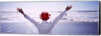 Framed Woman With Outstretched Arms On Beach, California, USA