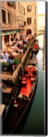 Framed Gondolas moored outside of a cafe, Venice, Italy