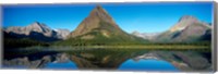 Framed Reflection of mountains in Swiftcurrent Lake, Many Glacier, US Glacier National Park, Montana, USA