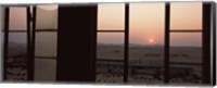 Framed Sunrise viewed through a window, Sperrgebiet, Kolmanskop, Namib Desert, Namibia