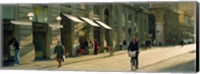 Framed Cyclists and pedestrians on a street, City Center, Florence, Tuscany, Italy