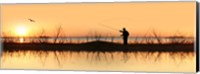 Framed Silhouette of a man fishing