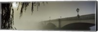 Framed Putney Bridge during fog, Thames River, London, England