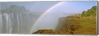 Framed Rainbow form in the spray created by the water cascading over the Victoria Falls, Zimbabwe