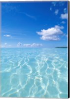 Framed Tropical water with blue skies in background