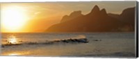 Framed Surfers at sunset on Ipanema Beach, Rio De Janeiro, Brazil
