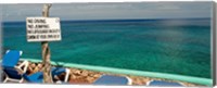 Framed Sign at Xtabi Hotel above cliffs, Negril, Westmoreland, Jamaica